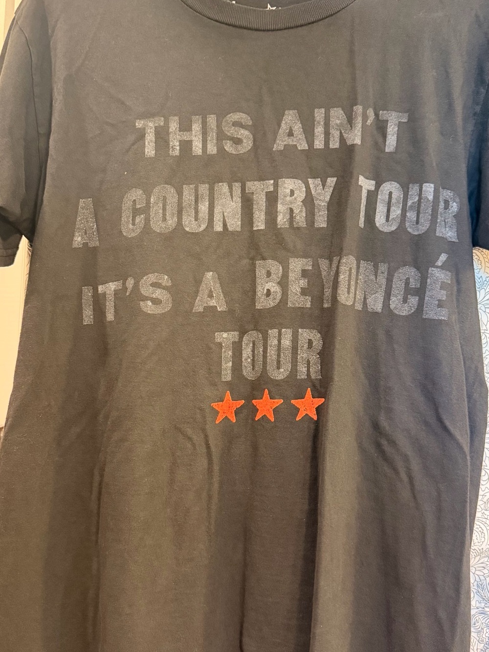 Black Graphic Short-Sleeve Tee with Orange Star Accents